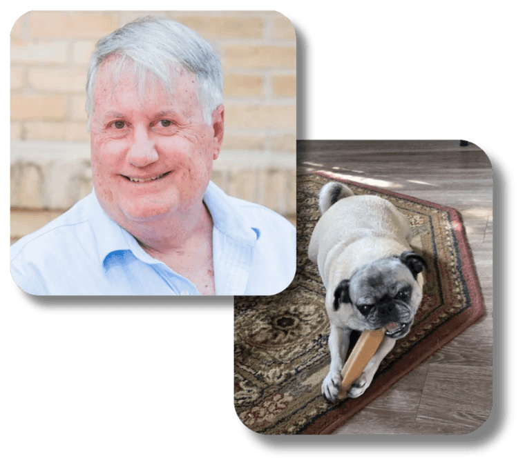Carl Griffin, and Lola Belle — a rescue pug — chewing a treat on a rug.